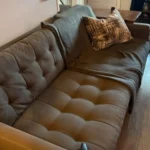 Large couch in a home ready for furniture and couch removal